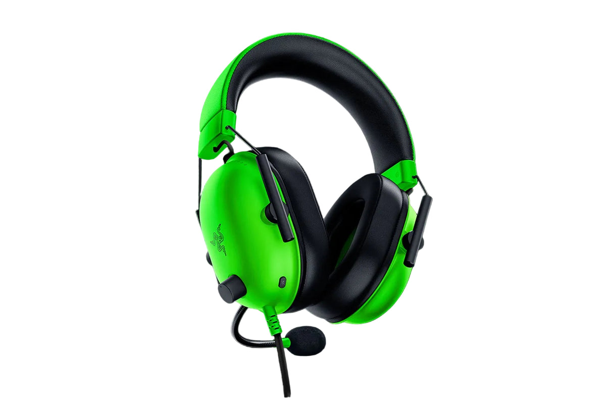 Green and black gaming headset on a white background