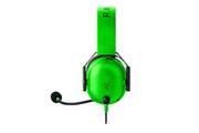 Green gaming headset with microphone on a white background